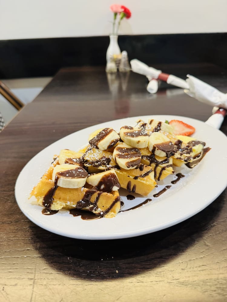 Bananas and chocolate waffle