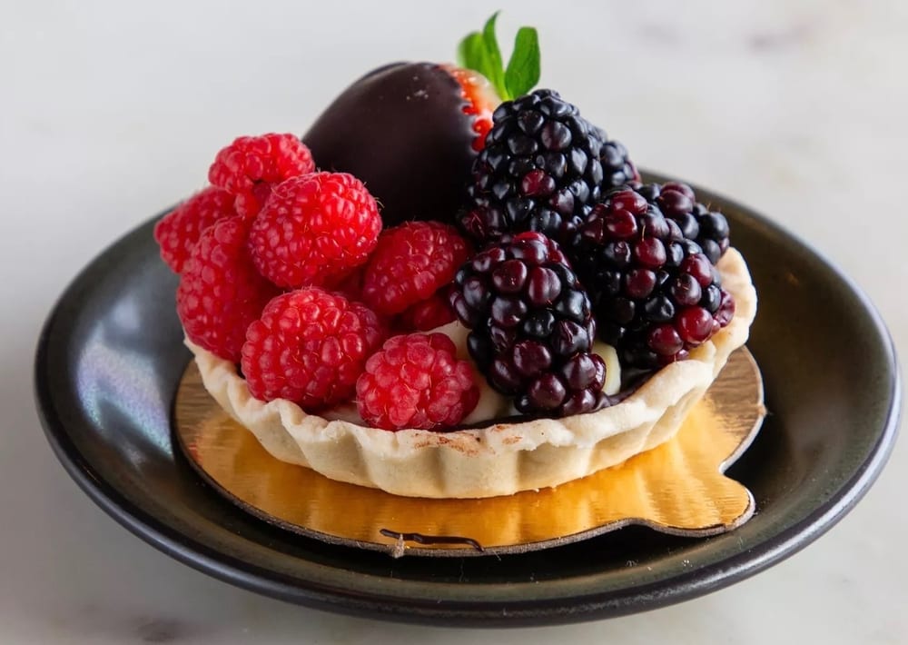 Fresh berry tart with raspberries and blackberries